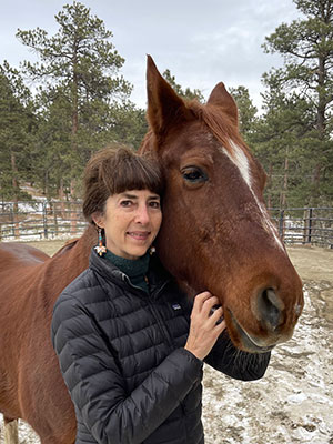 Gayle MacKenzie, DVM with her horse Rojo Sky